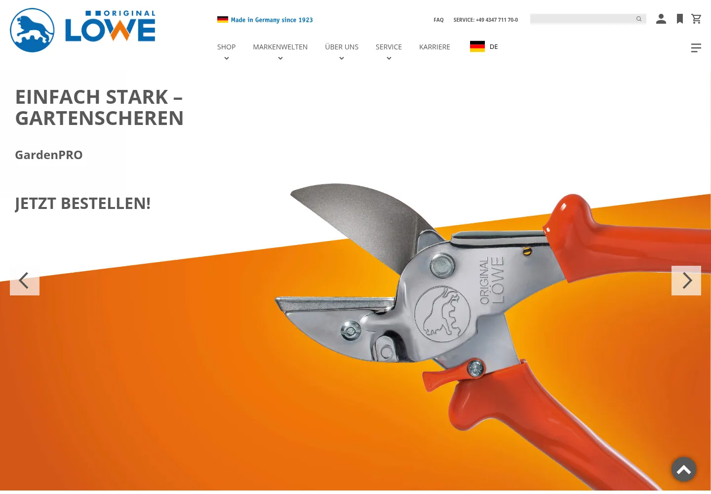 Startseite von Original LÖWE mit Gartenschere, Firmenlogo und einer Sprachauswahl in der Navigation.